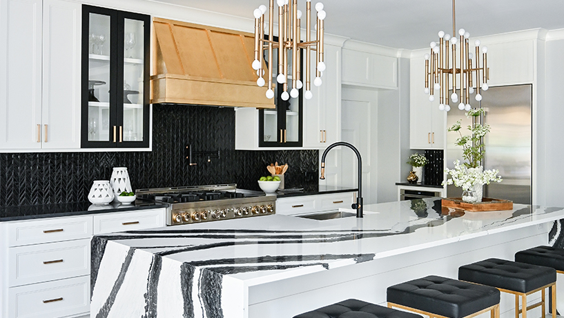 Beautiful modern kitchen design, kitchen faucet and kitchen decor, gray  marble kitchen island Stock Photo